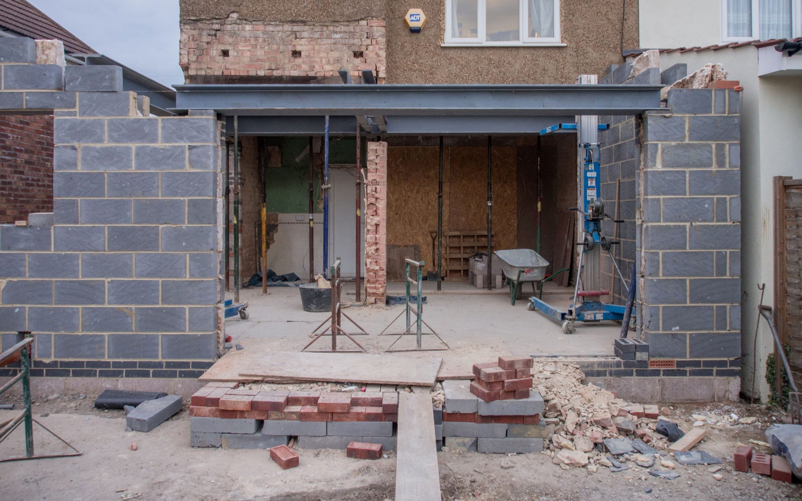 An addition under construction on a house