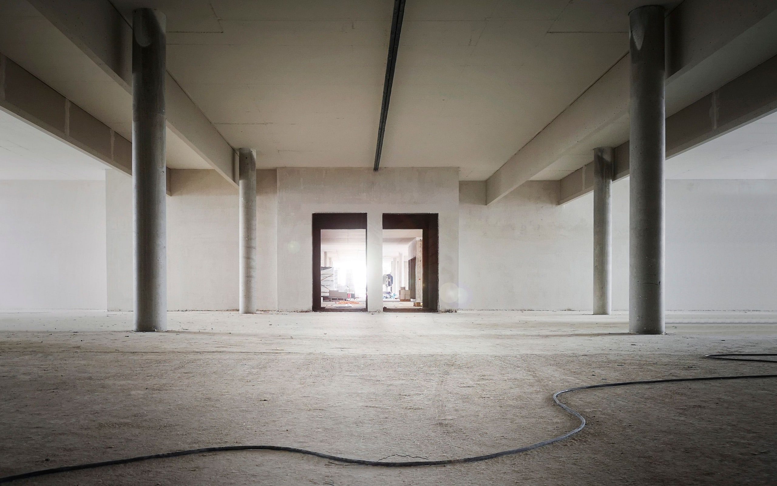 An unfinished lower level before development starts