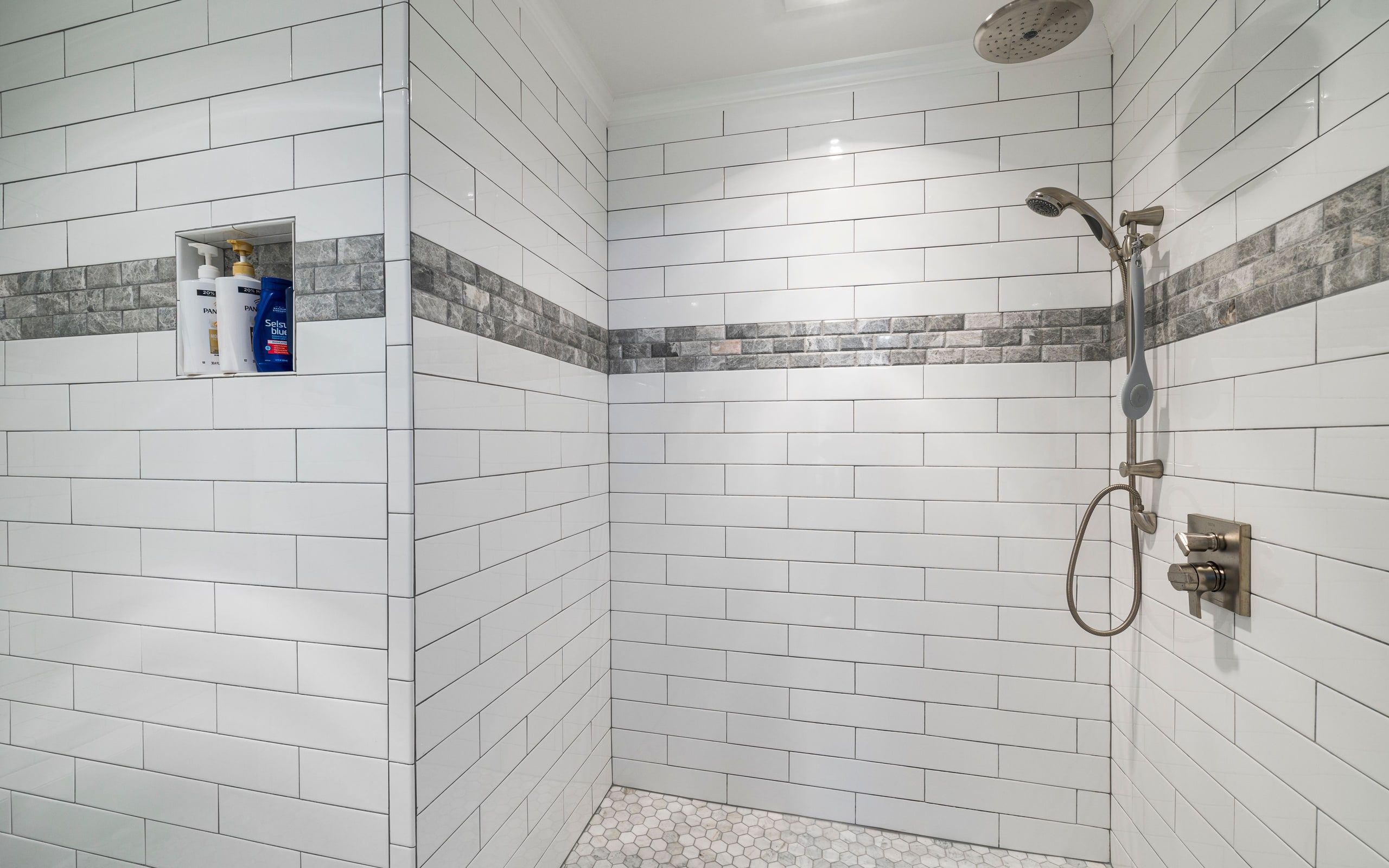 Bathroom tiling in progress on a prepared substrate
