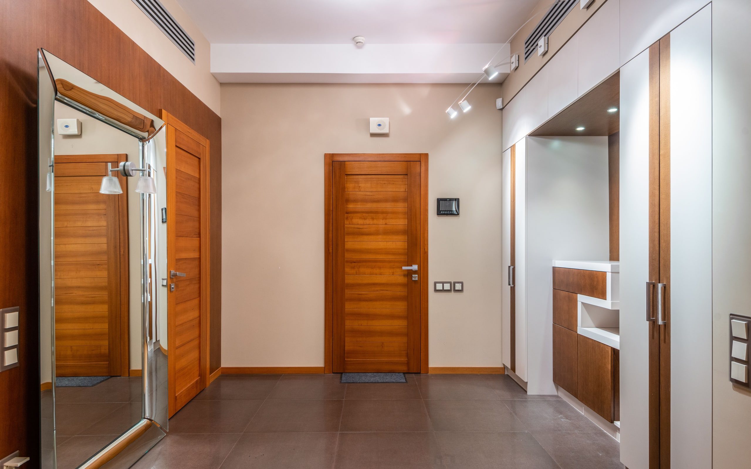 An empty hallway in a vacant unit
