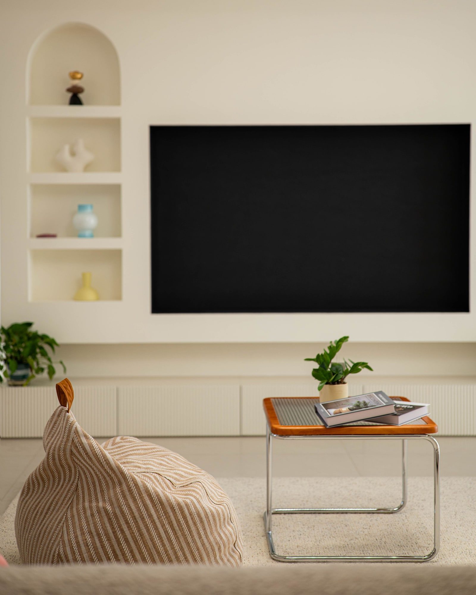 A basement room set up for seating and media