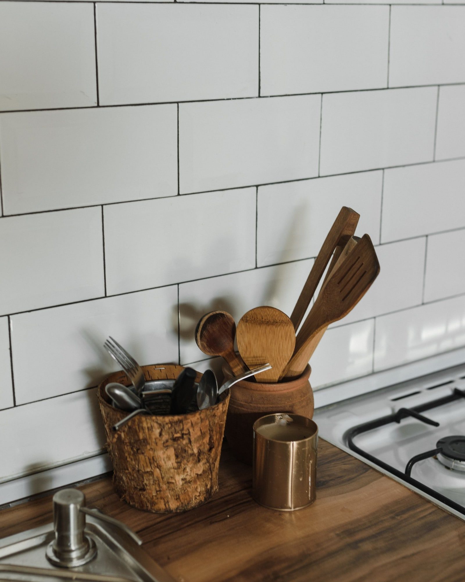 Tiled backsplash and counter detail in a finished kitchen